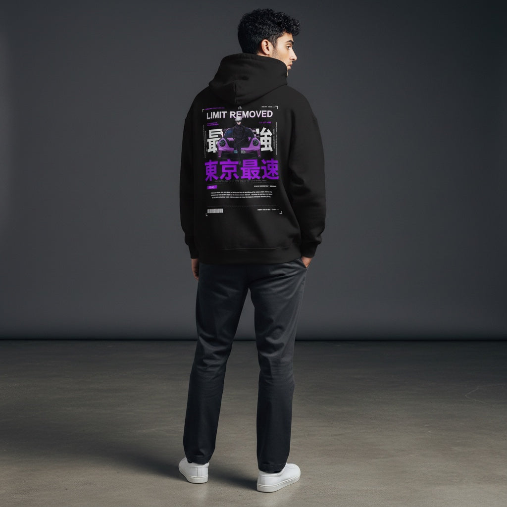 Avenue black hoodie with Tokyo speed graphic on the back featuring a sports car and kanji, worn by a man from behind.